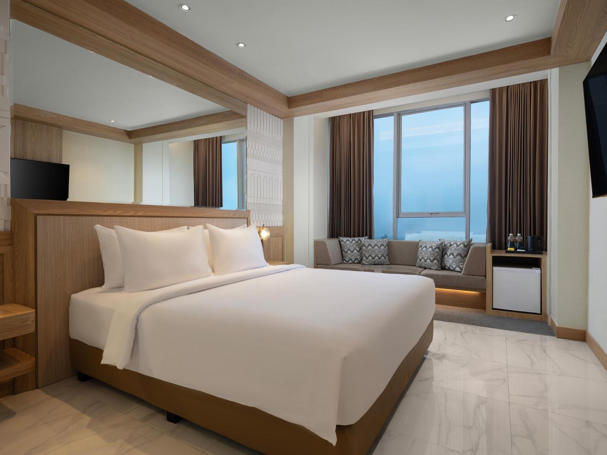 Golden Hill By Golden Tulip Hotel Tlekung Bagian luar foto